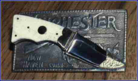 Belt buckle knife